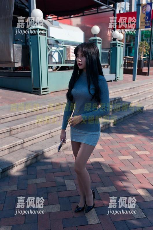 魔镜街拍 魔镜街拍:高清图册,绿色包臀短裙与长腿美女,光影交错的瞬间